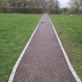 Red coloured tarmac pathways in Richmond, Surrey